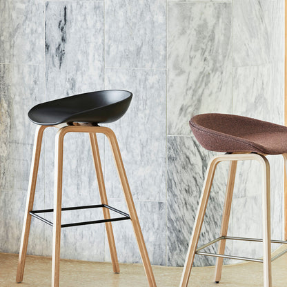 About A Stool AAS 32 by HAY - H 75 cm / Black Shell / Lacquered Oak Base