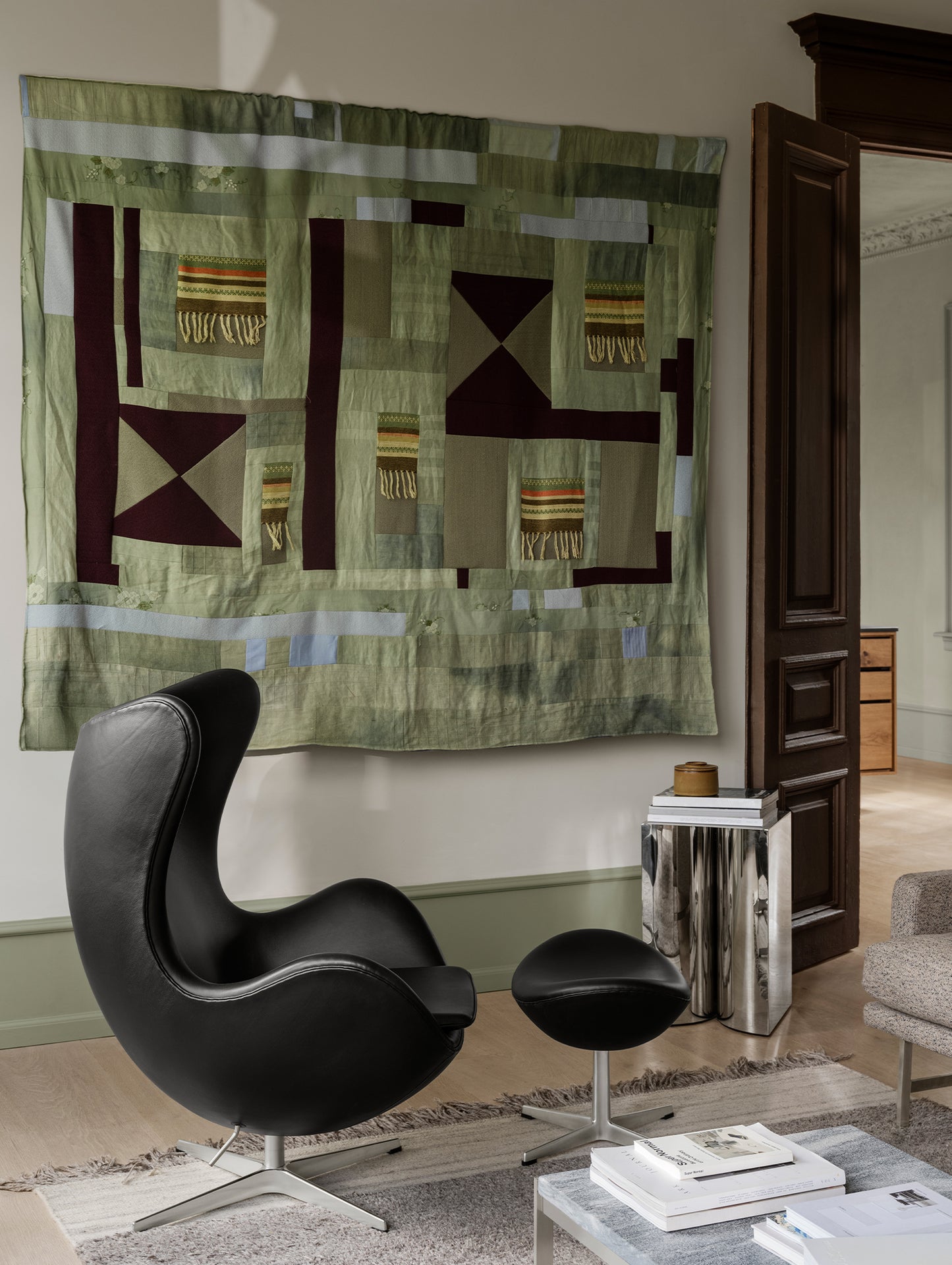 Egg Footstool by Fritz Hansen - Black Grace Leather