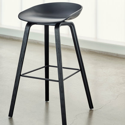 About A Stool AAS 32 by HAY - H 75 cm / Black Shell / Black Lacquered Oak Base