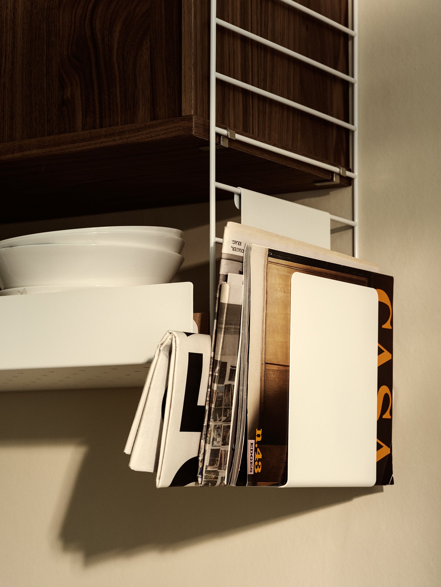 String Magazine Holder