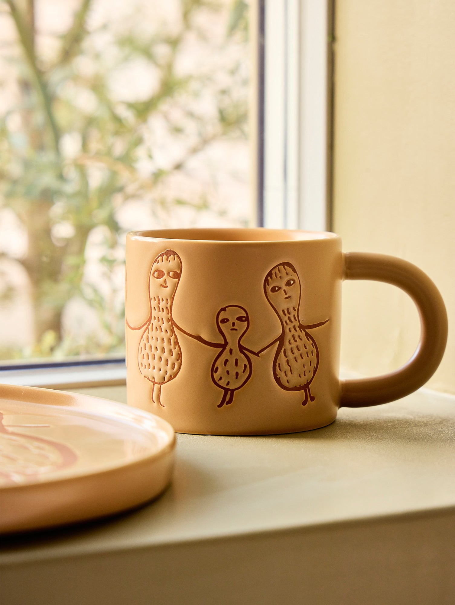 Peanut Mug by Donna Wilson
