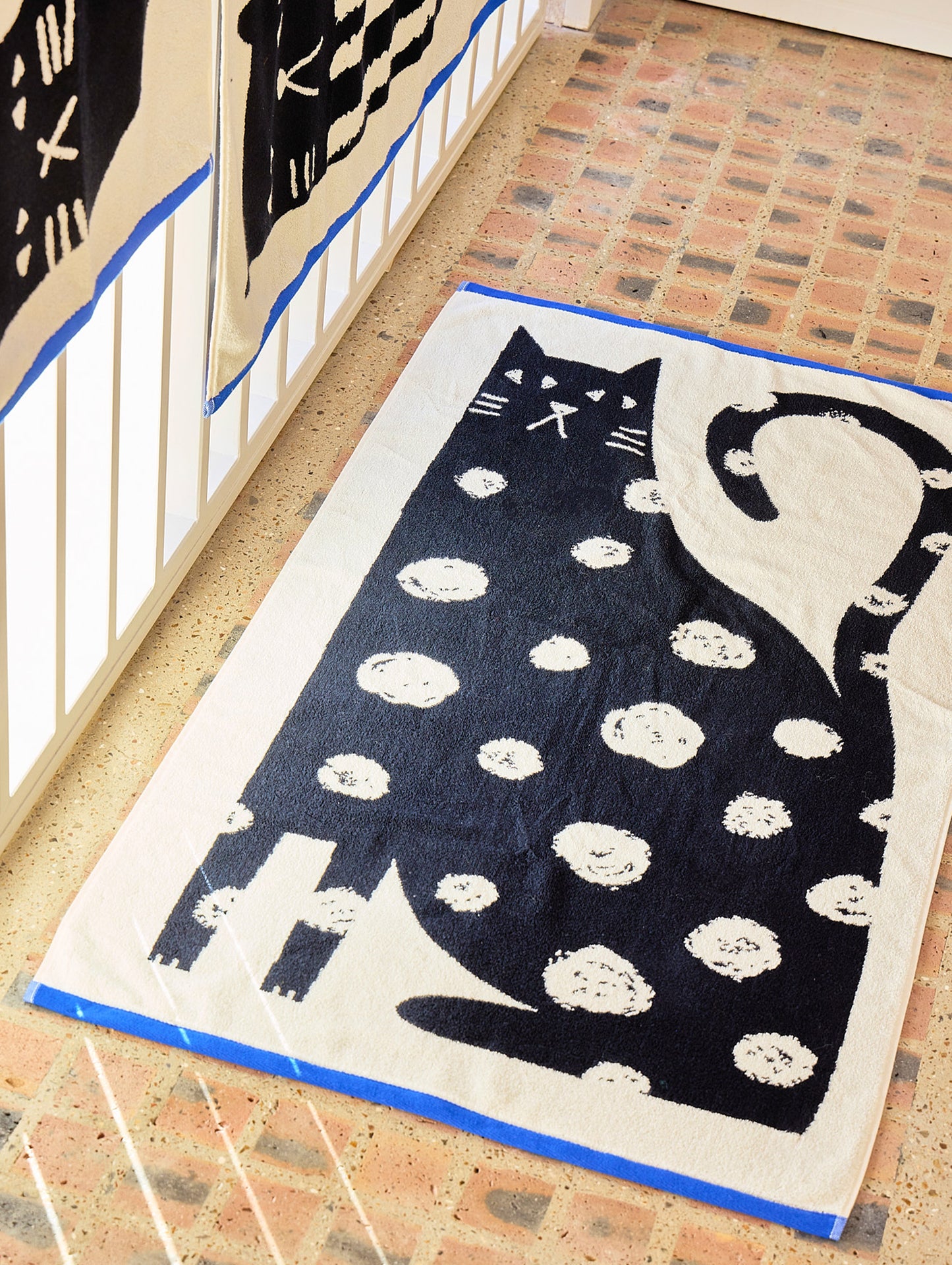 Lazy Cat Bath Towel by Donna Wilson