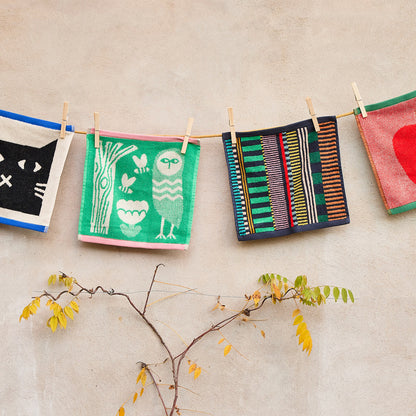 Lazy Cat Face Towel by Donna Wilson