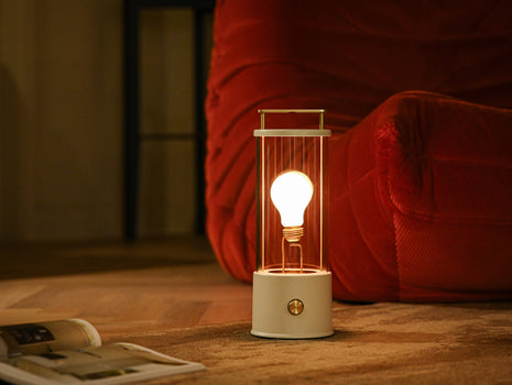The Muse Portable Lamp in Candlenut White by Tala