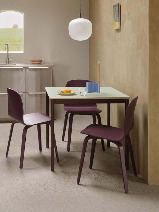 Base Table by Muuto - 70x70 / Light Green Laminate / Plywood Top with Brown Red Legs