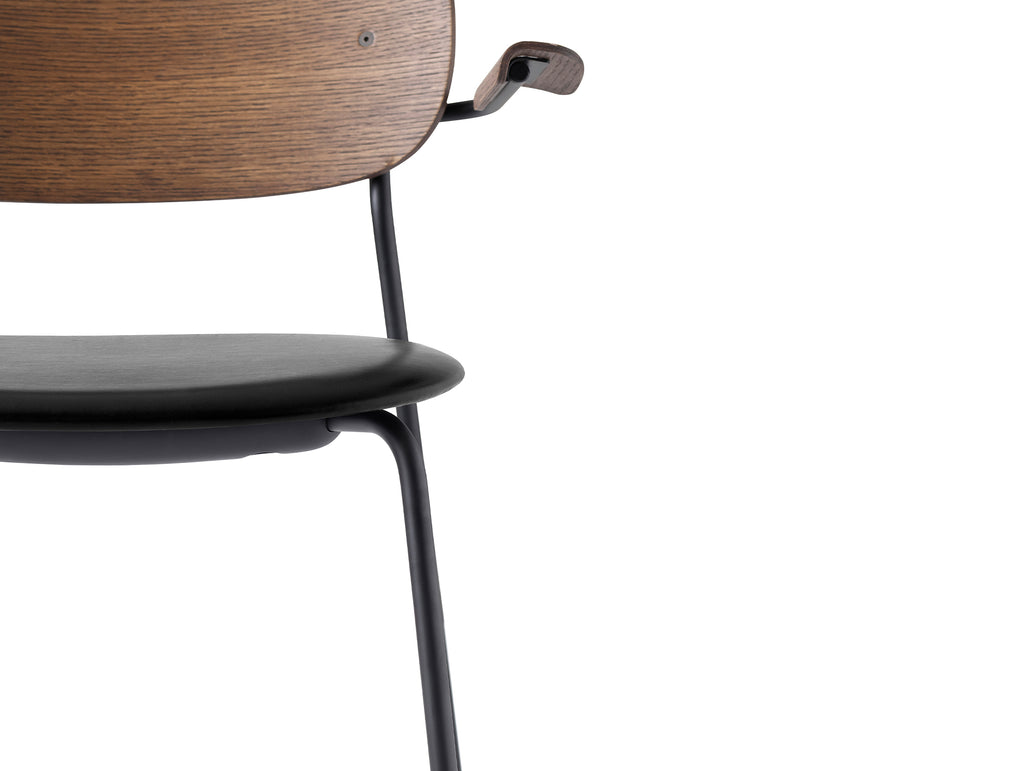 Co Dining Chair Upholstered by Menu - With Armrest / Black Powder Coated Steel / Dark Oak / Black Dakar Leather