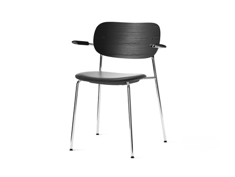 Co Dining Chair Upholstered by Menu - With Armrest / Chromed Steel / Dark Oak / Black Dakar Leather