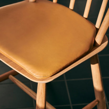 HAY J41 lacquered oak chair / Sense cognac seat cushion