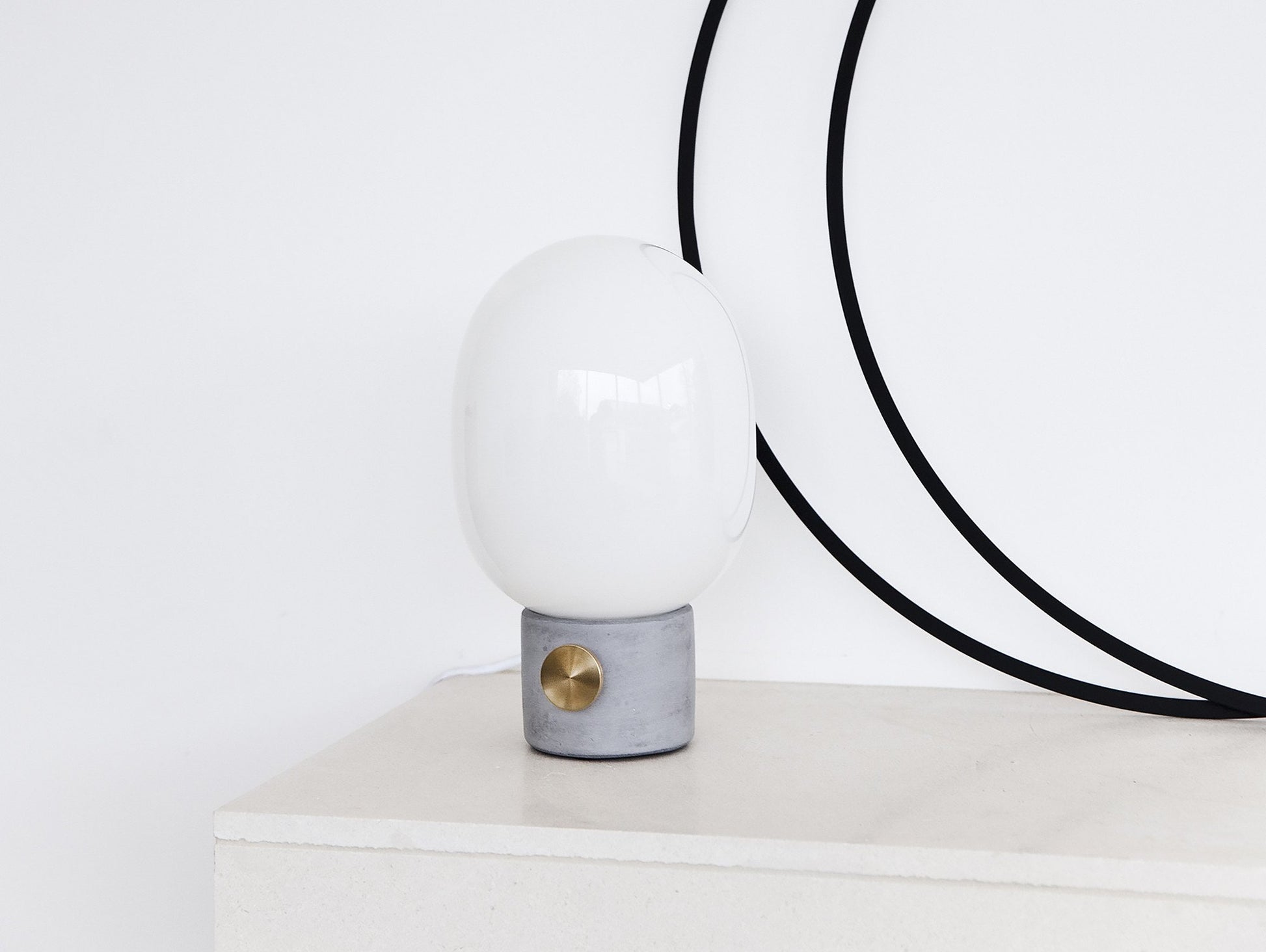 JWDA Concrete and Brass table lamp by Menu