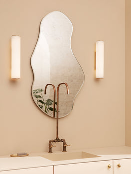 Pond Mirror by Ferm Living, Large - in the Bathroom with Vuelta Wall Lamps