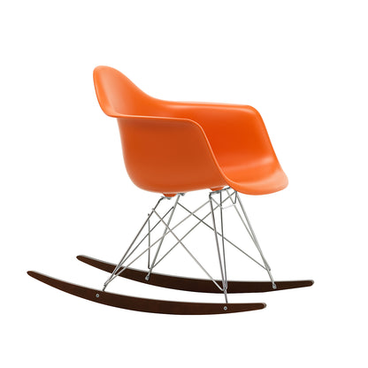 Eames RAR Plastic Armchair in Rusty Orange with Chrome Base and Dark Maple Rockers by Vitra