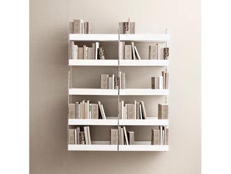 String White Metal Shelves in a library arrangement
