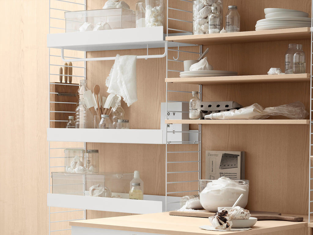 String White Metal shelf arrangement with Ash fold-out desk.