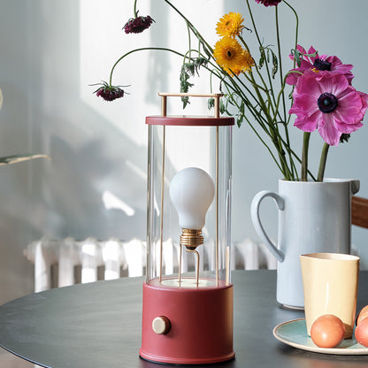 The Muse Portable Lamp in Pomona Red by Tala